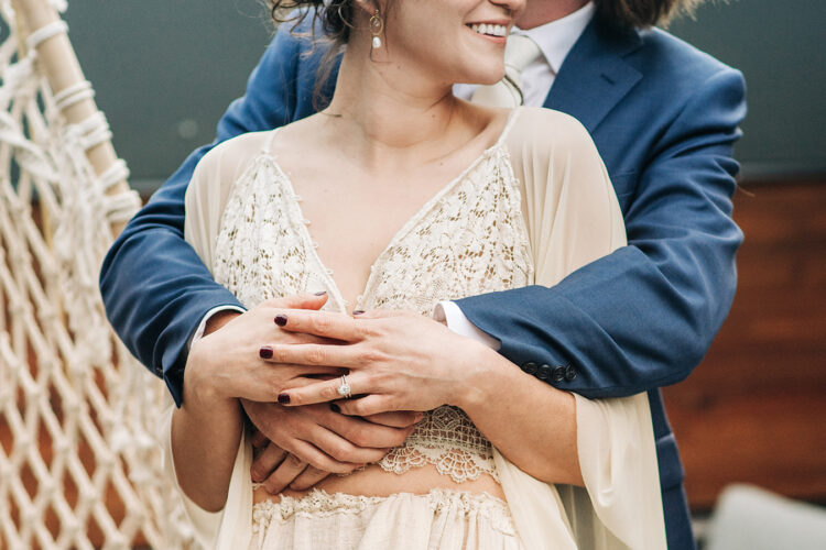 a couple embracing on their wedding day