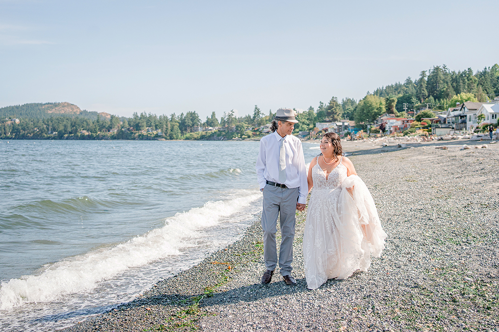 bride and groom on the beach in Cordova Bay at the Beach House Resturant